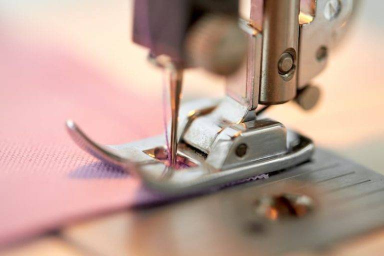 sewing machine presser foot stitching fabric