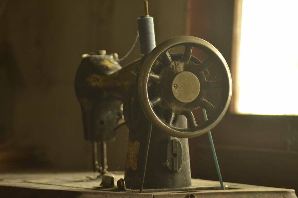 Old fashioned hand cranked sewing machine